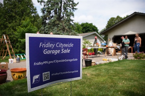 Citywide Garage Sale sign in front of a garage sale