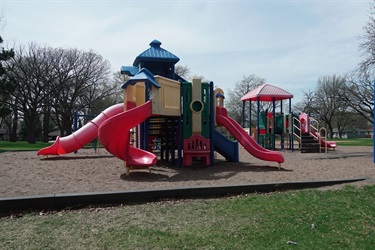 A playground set with several slides