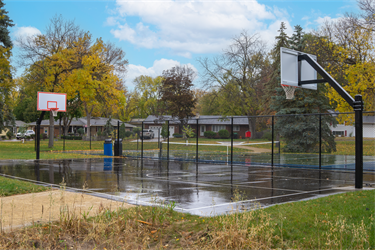 A basketball court with two hoops