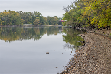 A rocky beach along the Mississippi River