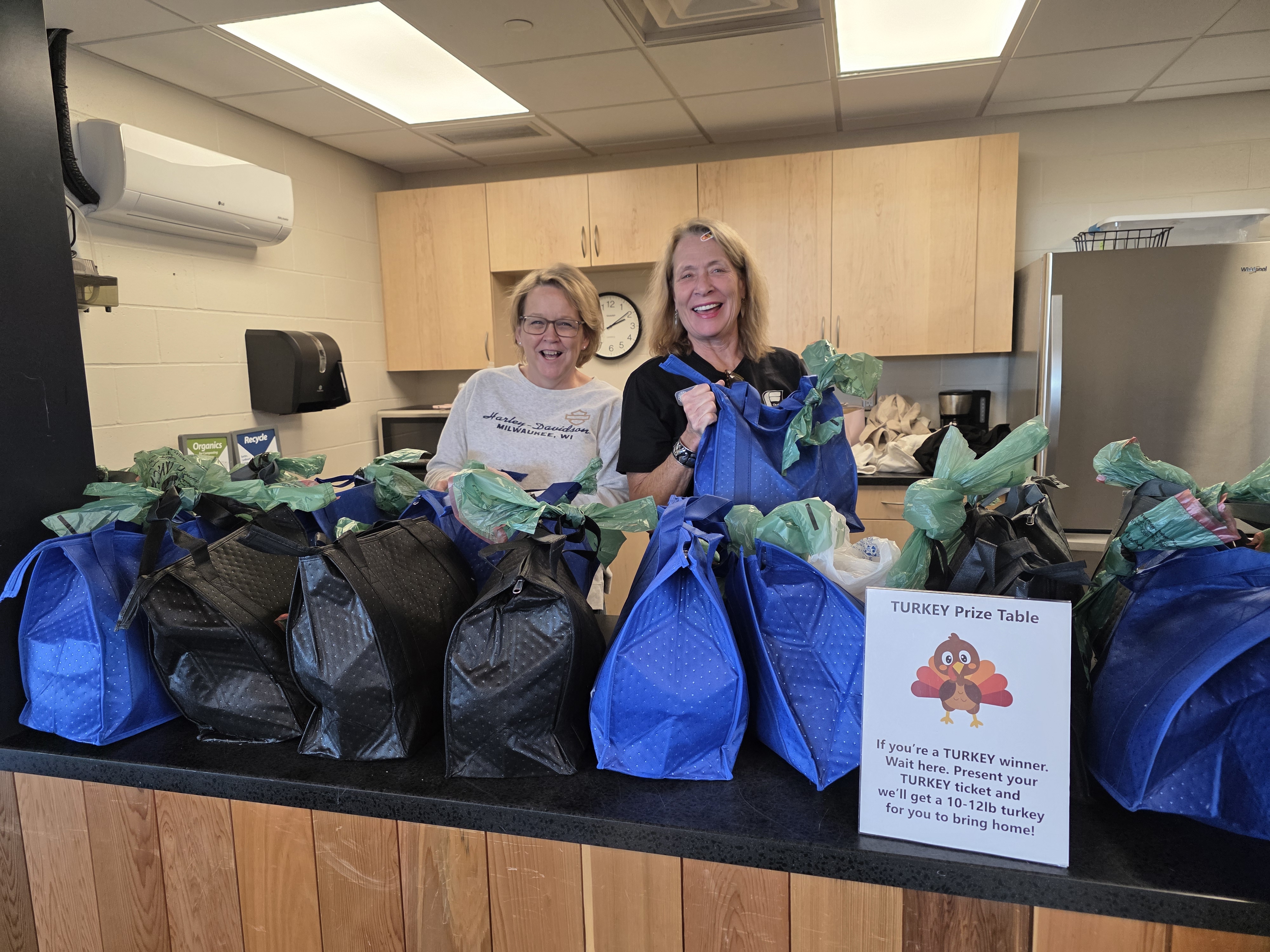 Volunteers Handing Out Turkeys