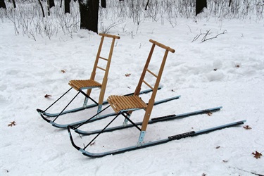 two kicksleds in the snow