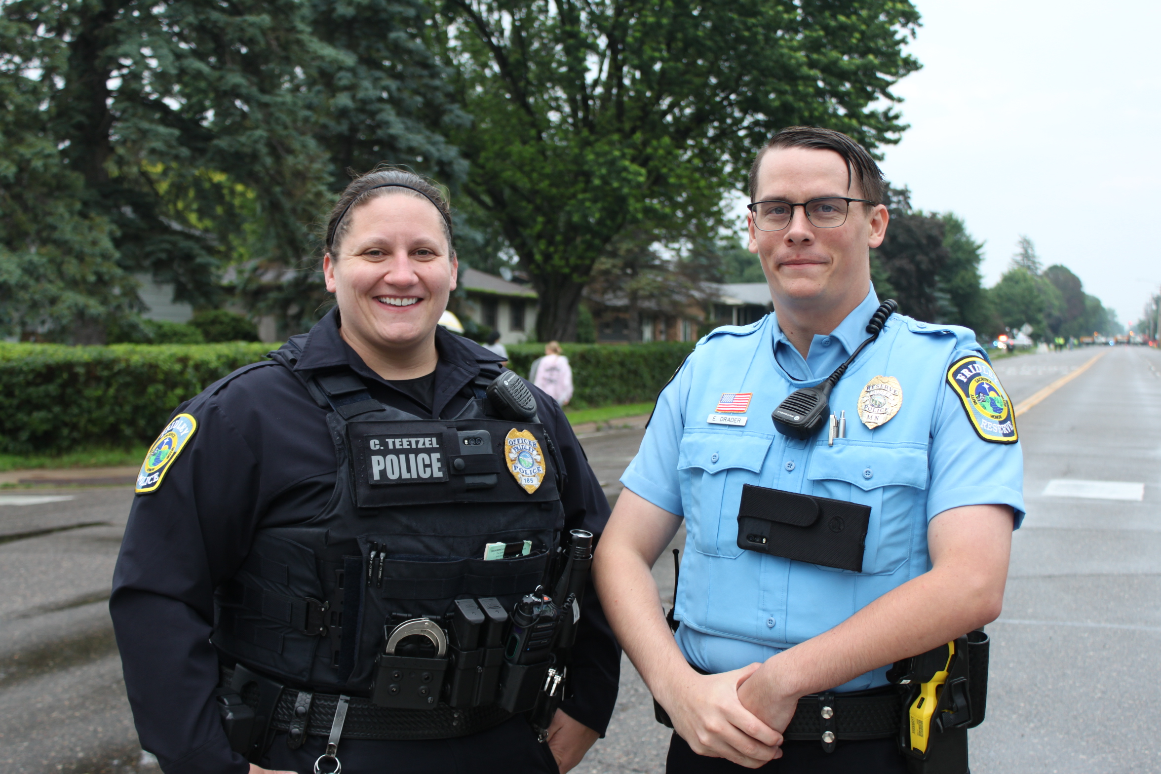 Two Police Officers posing at 49er Day parade in 2025