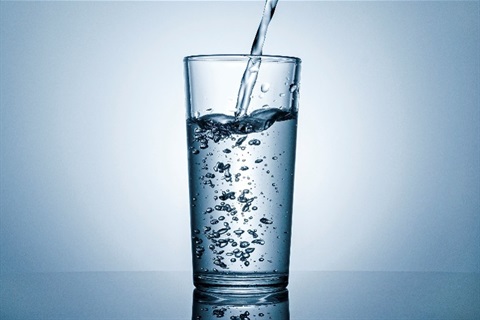 Water pouring into a glass