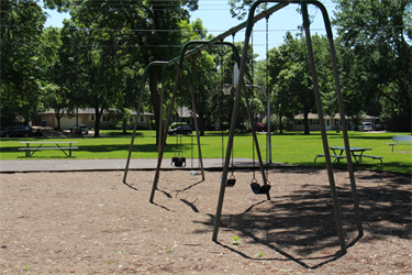 A swing set with four swings
