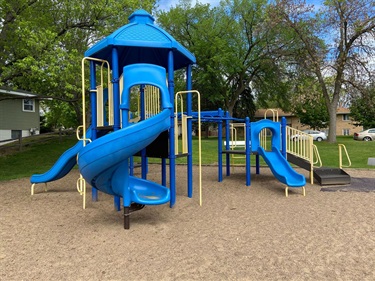 A playground set with multiple slides