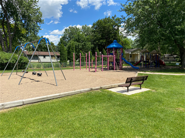 A playground and swingset